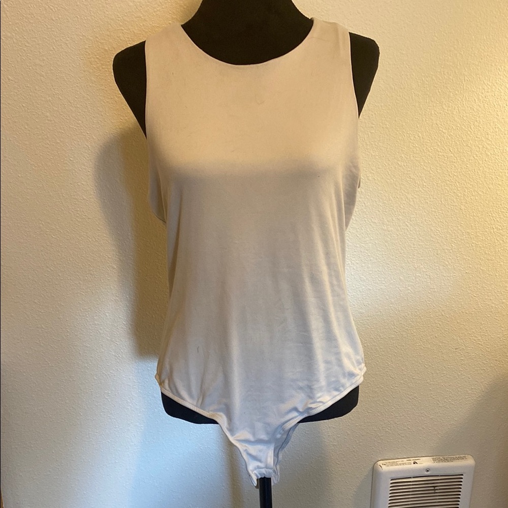 Women's beige bodysuit